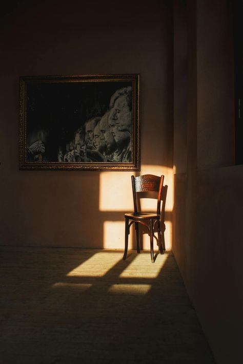 Empty Chair in Light in Room in Shadow · Free Stock Photo Indoor Room Photoshoot Ideas, Absence Photography, Empty Room Aesthetic, Light In Room, Ap Portfolio, Light And Shadow Photography, Photography Room, Chair Photography, Skeleton Crew