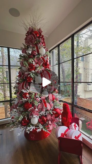 Liliana Jaimes| Holiday decor on Instagram: "look at me! Getting all the Christmas feels. Join me to decorate  this amazing  tree🎄  Christmas tree decorating services 🎄Book now!  Oct 15 to Dec 15 2024 season   Link in Bio   Video creds @marianjaimes.mp4   #christmas2024 #getinspired #houston #christmastreedecorating #christmastree #katytx #houstondecorator #houstonchristmas #riveroaks #lilijaimesxmastrees #lilijaimesdecor #christmas2024 #decorator #customdesign #navidad2024 #homedepot #homedepottrees #homedepotchrismastree #viral" Christmas Tree In Red And White, Red Snd White Christmas Tree, Red And White Poinsettia Christmas Tree, Where To Put My Christmas Tree, Santa Christmas Tree Ideas, Raz Christmas 2024, Red And Silver Christmas Tree Ideas, Red Xmas Tree Decorating Ideas, Christmas Decor Ideas Red And White