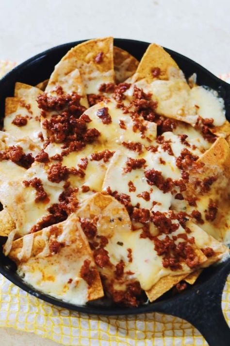 These chorizo nachos are so delicious! Whether you serve them as an appetizer, snack or dinner, they deliver! Packed with tons of cheese, chorizo, and tasty colorful toppings, and baked until bubbling and delicious - it’s no surprise that everyone loves them! #appetizer #snack #tailgate #partyfood #nachos #chorizo #cheese #ovenbaked #mexicanrecipe Baked Nachos, Cheesy Nachos, Jarred Salsa, Nachos Recipe Easy, Chicken Burritos, Baked Cheese, Nachos Recipe, Quick Healthy Meals, Onion Recipes