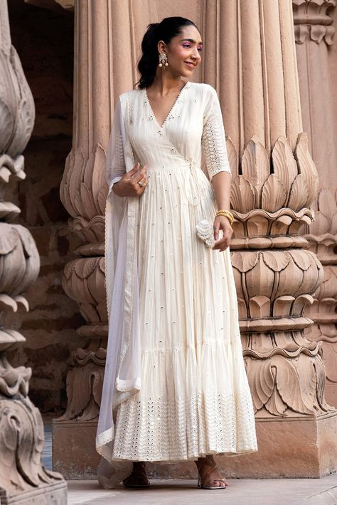 Shop for these amazing collections of Off White Angrakha: Cotton Mulmul And Dupatta: Tulle & Anarkali With For Women by PREEVIN online at Aza Fashions. Offwhite Anarkali Party Wear, White Anarkali Dress Pattern, Off White Chikankari Suit, Onam Churidar Design, Off White Churidar Designs, Anarkali Styling Ideas, Off White Suits Women Indian, White Angrakha Anarkali, White Kurta Outfits Women