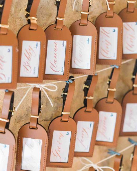 Insanely Creative Escort Cards and Seating Displays | Martha Stewart Weddings - Guests traveled to their seats with the help of these leather luggage tags, which doubled as useful favors for this reception. #wedding #weddinginspiration #escortcard #escortcarddisplay #weddingdecor Creative Seating Cards, Luggage Tag Wedding Favor, Reception Seating Chart, Wedding Reception Seating, Best Wedding Favors, Wedding Favors Fall, Reception Seating, Wedding Favors Cheap, Seating Cards