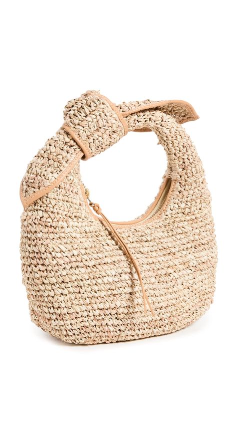 PRICES MAY VARY. Fabric: Woven straw Knotted handle, Leather trim Length: 9.5in / 24cm, Height: 4.75in / 12cm, Handle drop: 3.25in / 8cm, Depth: 3.5in / 9cm Zip at top Textile lining The Josie Knot Bag Best Beach Bag, Knot Bag, Slouch Bags, Woven Raffia, Straw Tote, Beach Ready, Market Tote, Kids Luggage, Leather Trims