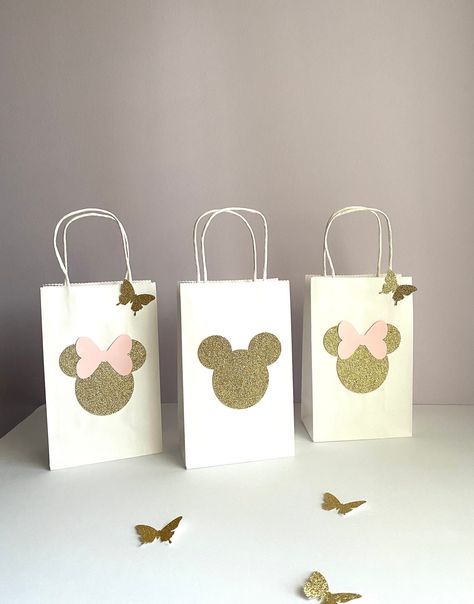 Minnie Mouse Gift Bags Ideas, Pink And Gold Minnie Mouse Party Decoration, Minnie Mouse Gold And Pink Party, Minnie Mouse Pink Birthday Party Ideas, Minnie Mouse Birthday Party Favors, Pink And Gold Minnie Mouse Party, Minnie Mouse Candy Bags, Minnie Mouse Gift Bags, Minnie Mouse Party Bags