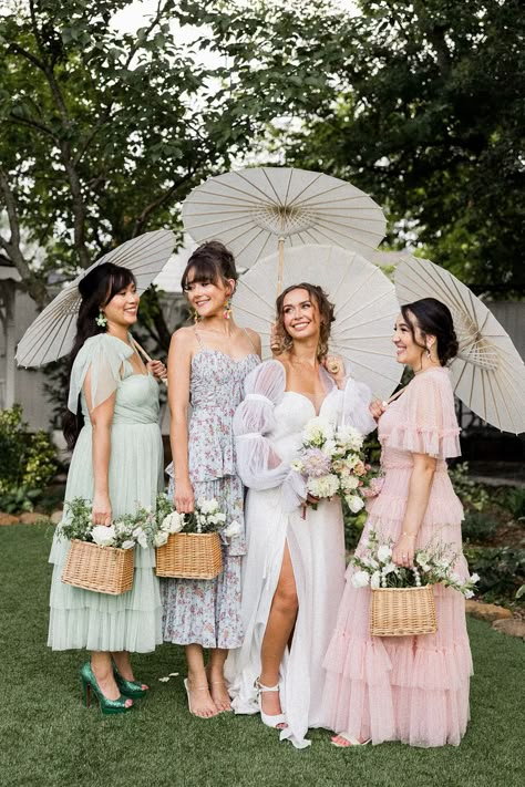 If you are planning a garden wedding and are looking for bridesmaid outfit ideas, save this photo filled with bridesmaid inspiration! From the bridesmaid basket bouquets to the mixed bridesmaid dresses and parasol umbrellas, these bridesmaids were set for this garden wedding in Georgia.Kim Hymes Photography | Atlanta wedding photographer Mix Matched Bridesmaid Dresses, Bridesmaid Basket, Auburn Wedding, Bridesmaid Baskets, Pastel Bridesmaids, Mix Match Bridesmaids, Parasol Wedding, Bright Wedding Colors, Bridal Parties Pictures