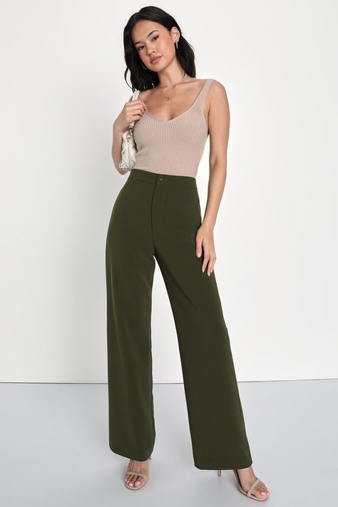 Have all the confidence you need with the Lulus A Power Mood Olive Green High-Waisted Wide Leg Trouser Pants! Lightweight crepe woven fabric shapes a boss-babe, high banded waist with a hidden zip fly and a covered button closure. Wide pant legs fall to ankle-grazing hems and feature decorative welt pockets at the back. Fit: This garment fits true to size. Length: Floor length. Size medium Inseam: 30.75 Front Rise: 12.00 Waist: Fitted - very fitted at natural waist. Hip: Fitted - consider sizing Olive Green Trousers Outfit, Green Trousers Outfit, Olive Green Pants Outfit, Olive Green Outfit, Best Work Pants, Green Pants Outfit, Dark Green Pants, Olive Clothing, High Waisted Pants Outfit