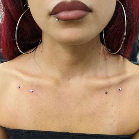 These dermal piercings are the perfect accessories to your anatomy 🤩  Dermal piercing by @shinysharpthings   Soho, Union Square, and Williamsburg  11AM-9PM 7 DAYS A/W🕘 WALK-INZ OR BOOK ONLINE..📕 TATTOOS & PIERCINGS, NO ATTITUDE, NO MISERABLE HOOPS TO JUMP THROUGH....🚫 WALK-INZ WELCOME OR BOOK ONLINE AT ⚔️livebytheswordtattoo.com⚔️ . . . . #livebythesword #dermalpiercings #microdermals #surfacepiercing #bodypiercing Dermals On Chest, Collar Bone Dermal Piercings, Cheekbone Dermal Piercing, Lower Back Dermals, Body Dermals, Shoulder Piercing, Dermal Cheek Piercing, Lower Back Piercings Dimples, Dermal Back Piercings