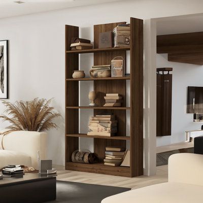 It gives your house a sophisticated touch with its warm walnut hue and streamlined form that fits into any interior theme. With its several shelves, this bookshelf offers plenty of room for storing your books, picture frames, and ornaments. You can maintain a clean and organized living space by keeping your items neatly stored in the extra storage compartments. Inspired by Scandinavian design's simplicity and minimalism, this bookcase blends style with utility. It's the ideal complement to any s Modern Living Room With Bookshelves, Modern Bookshelf Living Room, Tall Shelf Decor Living Room, Living Room Shelving Ideas, Walnut Bookshelf, Modern Bookshelf Design, Minimalist Bookshelf, Bookcase Inspiration, Bookshelf Designs