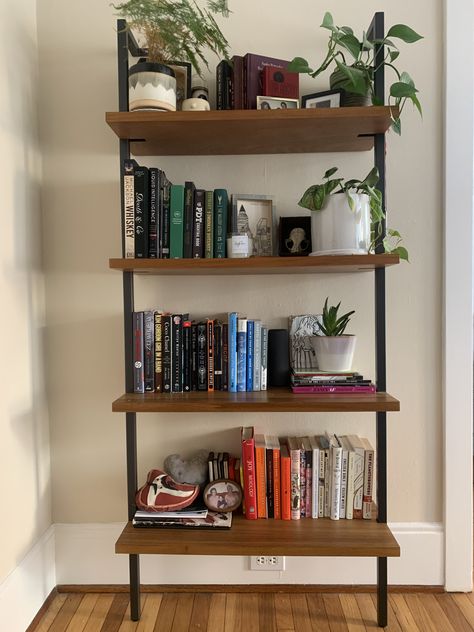 Brown Book Shelf Aesthetic, Book Shelf Minimal, Book Shelf Minimalist, Study Shelf Ideas, Shelf With Books And Plants, Bookshelves With Plants And Books, Book Shelves With Plants, Book Plant Shelf, Industrial Bookshelf Decor