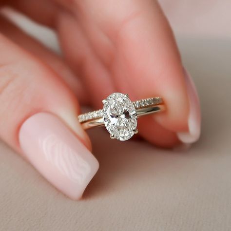 ENGAGEMENT RING DETAILS✧ Center Stone Weight: 1.50CTW (9*6MM)✧ Center Stone: Oval Cut✧ Center Stone Type: Moissanite✧ Side Stone Weight: 0.10CTW✧ Side Stone: Round Brilliant Cut✧ Moissanite Details: DEF Color, VVS+ Clarity✧ Band Width: Approx. 1.80MM WEDDING BAND DETAILS✧ Stone Weight: 0.40CT✧ Stone Cut: Round Brilliant✧ Stone Type: Moissanite✧ Moissanite Detail: DEF Color, VVS+ Clarity✧ Band Width: Approx. 1.80MM METAL DETAILS ✧ Metal: Solid Gold✧ Metal Purity: Available Options 10K | 14K | 18K Anniversary Ring Set, Moissanite Wedding Ring Set, Moissanite Engagement Ring Set, Oval Diamond Ring, Detailed Engagement Ring, Moissanite Engagement Ring Oval, Image 3d, Moissanite Diamond Rings, Bridal Engagement Rings