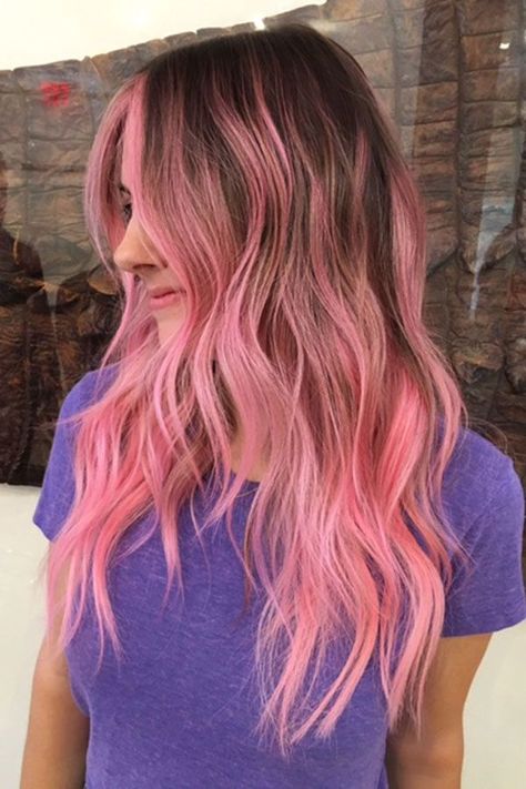 As the saying goes, everything old is new again. And those shades of pink that took a backseat to the rainbow-hair trend for awhile? They're coming back in a big way. Yes, rose-gold hair hit Instagram earlier this year, but that was just the tip of the iceberg. This next wave is warmer, softer Dimensional Pink Balayage, Fun Easy Hair Color Ideas, Hair Pop Of Color Ideas, Fun Ways To Color Hair, Low Maintenance Vibrant Hair Color, Money Piece Balayage Pink, Rooty Pink Hair, Brunette With Colorful Highlights, Soft Pink Balayage