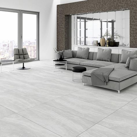 Porcelain tiles can be a perfect solution for interior designing and indoor flooring due to benefits, such as durability, beauty and resistance, and easy maintenance. Grey Floor Tiles Living Room, Porcelain Tile Floor Living Room, Grey Tiles Living Room, Gray Porcelain Tile Floor, Grey Flooring Living Room, Tattoo Modern, Tile Floor Living Room, White Porcelain Tile, Gray Porcelain Tile