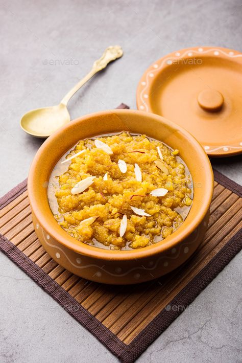 Moong Dal Halwa or Mung Daal Halva is an Indian sweet /dessert recipe, garnished with dry fruits by stockimagefactory. Moong dal halwa is a classic Indian sweet dish made with moong lentils, sugar, ghee and cardamom powder #Sponsored #dessert, #sweet, #Indian, #dry Moong Daal Halwa, Mung Dal Halwa, Moong Dal Halwa, Sita Mata, Goddess Sita, Moong Dal, Sweet Dish, Veg Food, Indian Dessert Recipes