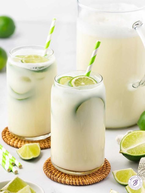 Made with fresh lime juice, lime zest, and sweetened condensed milk, Brazilian Lemonade is a rich, luscious, and super refreshing family-friendly drink. Perfect for hot summer days! Brazilian Lemonade, Limeade Recipe, Lemonade Cocktail, Printable Recipe Cards, Lemonade Recipes, Lime Zest, Strawberry Lemonade, Sweetened Condensed Milk, Fresh Lime