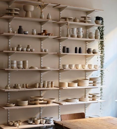 Pottery Shelf Display, Pottery Organization, Ceramic Store Interior Design, Ceramic Studio Aesthetic, Pottery Drying Shelves, Pottery Studio Shelves, Ceramic Studio Shelves, Pottery Shelves, Pottery Shelves Ceramic Studio