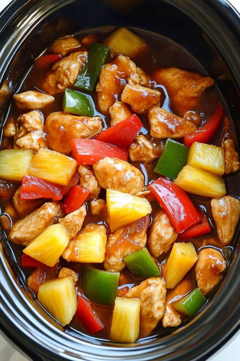 This easy Crockpot sweet and sour chicken is even better than takeout! With just a few key ingredients, you have a dump-and-go meal the family will love. Sweet N Sour Chicken Crock Pot, Slow Cooker Chicken Stir Fry Recipes, Chicken Cubes Crockpot Recipes, Slow Cooker Bbq Pineapple Chicken, Sweet And Sour Chicken Freezer Meal, Crockpot Sweet And Sour Chicken Recipes, Crockpot Firecracker Chicken, Crock Pot Sweet And Sour Chicken, Asian Crockpot Meals