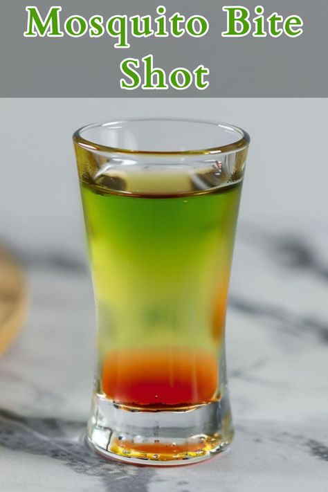 The Mosquito Bite Shot is a vibrant, tangy, and slightly sweet cocktail that packs a punch with its bold flavors. Combining the smoothness of vodka, the tartness of sour apple pucker, the melon sweetness of Midori, and a splash of grenadine for a hint of fruitiness, this shot is both visually appealing and delightfully refreshing. Apple Pucker Shots, Sour Apple Pucker, Sweet Cocktail, Apple Pucker, Most Popular Cocktails, Sweet Cocktails, Mosquito Bite, Cocktail Recipes Easy, Long Drink