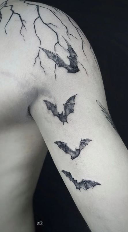 100+ Trendy Bat Tattoos, Designs & Meanings - Tattoo Me Now Bat Tattoo Ideas Gothic, Meaningful Gothic Tattoos, Bats Tattoo Shoulder, Bats On Arm Tattoo, Halloween Tattoo Ideas Men, Three Bats Tattoo, Bat Tattoo On Arm, Bat Filler Tattoo, Bat And Spider Tattoo