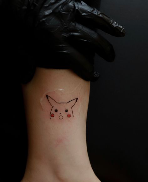 Surprised Pikachu tattoo, pokemon tattoo, pikachu tattoo Surprised Pikachu Tattoo, Small Pokemon Tattoo Simple, Pokemon Card Tattoo, Pokémon Card Tattoo, Fine Line Pokemon Tattoo, Pokemon Minimalist Tattoo, Simple Pokemon Tattoo, Persona Tattoo, Small Pokemon Tattoo