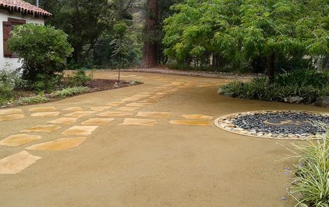 This California Zen landscape was done for a Buddhist retreat in the LA area.  Its refined simplicity adds to the serenity of the natural setting.  Besides the flagstone walkways on top of DG--decomposed granite there is the unique emblem construction.  The center symbol was made of small gravel, while outside of it are different colors of river rocks. In addition to the restful aesthetics of this landscape, the practical benefits are the water savings & low-maintenance needed. Backyard Mulch Landscaping, Backyard Reading, Buddhist Retreat, California Landscaping, Decomposed Granite Patio, Zen Landscape, Desert Backyard, Zoysia Grass, Crushed Granite