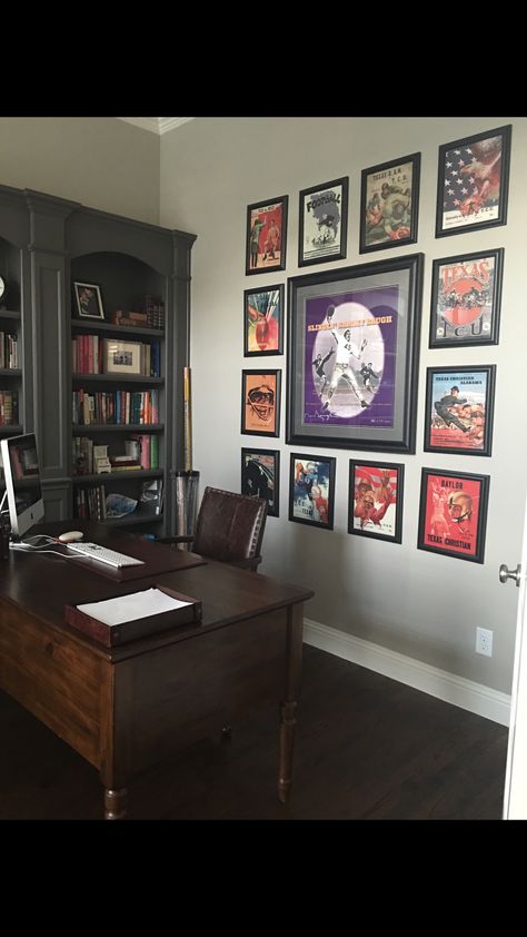 Office Decor Sports Theme, Sports Themed Home Office, Sports Office Ideas For Men, Office Sports Decor, Sports Office Decor Ideas Men, Home Office Sports Theme, Sports Themed Office Ideas, Sports Card Shop Interior, Sports Memorabilia Office