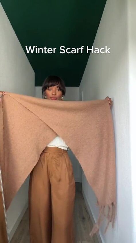 Here’s a neat way to wear a fringed scarf as the weather gets cooler. Learn how to DIY a cozy scarf top in this quick and easy post. Blanket Scarf Outfit How To Wear A, How To Make A Cape From A Scarf, Wearing A Wrap Shawl, How To Make A Poncho From A Scarf, How Wear Scarf, Scarf To Kimono Diy, Long Shawl Outfit, Clothes From Scarves, Scarf Styles Videos