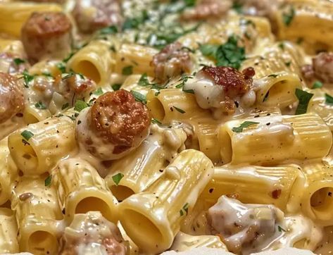 Garlic Sausage Rigatoni, Creamy Roasted Garlic Sausage Alfredo Rigatoni, Creamy Spicy Garlic Noodles With Sausage, Garlic Butter Sausage Pasta, Rigatoni Fiorentina Recipe, Malai Rigatoni, Garlic Sausage Alfredo Rigatoni, Italian Sausage Alfredo Pasta, Alfredo Sausage Pasta