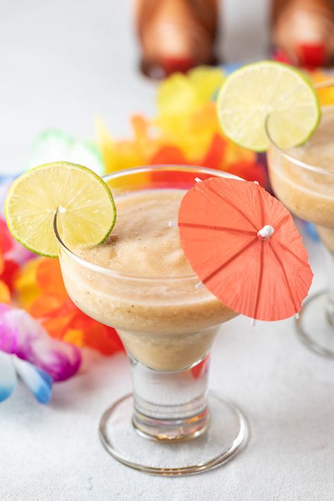 Frozen Banana Daiquiri - when the days are hot, whip up one of these frosty adult beverages! One of our favorite frozen cocktail recipes! Since bananas are so good for you, you practically have to make it! #bananadaiquiri #frozencocktails Frozen Banana Daiquiri Recipe, Banana Rum Drinks, Frozen Daiquiri Recipe, Frozen Banana Recipes, Banana Daiquiri, Frozen Strawberry Daiquiri, Frozen Daiquiri, Daiquiri Recipe, Frozen Cocktail