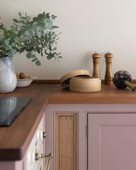 12+ Pink Paint Colors for Your Kitchen Cabinets that are Inspirational! Earthy Pink Kitchen, Pink Cabinets Black Countertop, Blush Cabinets Kitchen, Dusty Rose Cabinets, Mauve Cabinets Kitchen, Pink Wood Kitchen, Blush Kitchen Cabinet, Dusty Rose Kitchen Cabinets, Pink Beige Kitchen