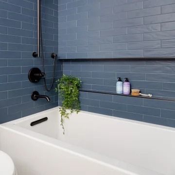 75 Alcove Bathtub with a Niche Ideas You'll Love - July, 2024 | Houzz Tub Niche, Bathtub Alcove, Beach Style Bathroom, Blue Bathroom Tile, Modern Remodel, Bathtub Tile, Battery Park, Contemporary Light Fixtures, Jack And Jill Bathroom