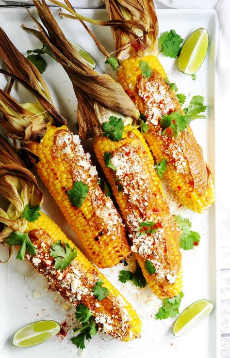 Grilled Mexican Corn on the Cob (also called Mexican Street Corn or Elote Corn) is a favorite street food in Mexico that's easy to make at home on your grill with this simple recipe. Serve it in this classic way or mix things up and serve it as a Mexican street corn recipe off the cob, aka Mexican Street Corn Salad! #mexicanstreetcorn #mexicancornonthecob #cornonthecob #grilledmexicanstreetcorn #cincodemayo #mexicancorn #elotecorn Grilled Mexican Corn, Mexican Corn On The Cob, Mexican Street Corn Recipe, Street Corn Recipe, Mexican Street Corn Salad, Mexican Corn, Dish Ideas, Side Dish Recipes Easy, Mexican Street Corn