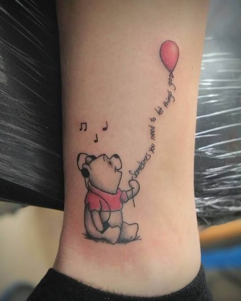 101 Amazing Winnie The Pooh Tattoo Designs You Need To See! 51 Outsons Lorraine, Mini Winnie The Pooh Tattoo, Winnie The Pooh Minimalist Tattoo, Winnie The Pooh Tattoos Small, Winnie The Pooh With Balloon Tattoo, Winnie The Pooh Quotes Tattoo Ideas, Winnie The Pooh Memorial Tattoo, Winny The Pooh Tattoos, Winnie The Pooh Small Tattoo