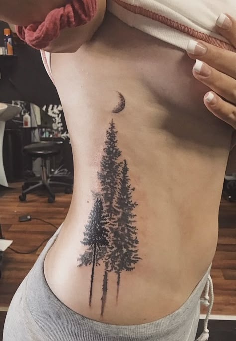 Pine Tree Tattoo Ribs, Moon And Tree Tattoo Designs, Pine Tree Tattoo Women, Pine Tree Back Tattoo, Forest Hip Tattoo, Evergreen Trees Tattoo, Washington Inspired Tattoos, Pine Tree Tattoo Back, Tattoo Ideas Forest