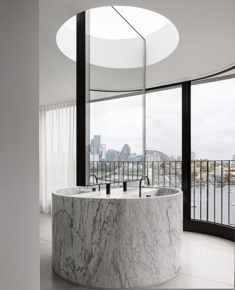 The primary ensuite bath and vanity in the Kurraba Penthouse are carved from single blocks of Statuarietto marble. A circular skylight with… | Instagram Marble Basin, Marble Detail, Marble Island, Bathroom Oasis, Marble Bath, Stone Bath, Sydney Harbour, Bathroom Spa, Curved Glass