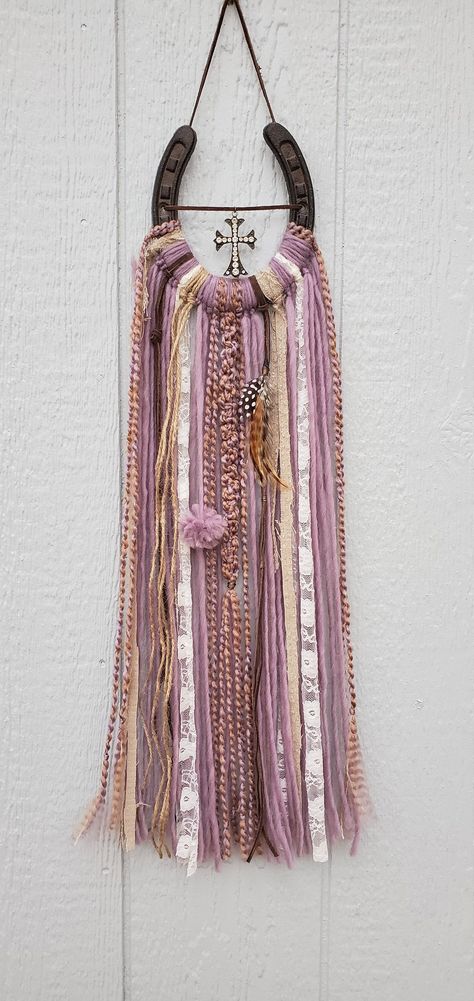 To purchase go to Etsy@HorseshoesAndBling. Lavender purple western rustic horseshoe art dream catcher wall decor wall hanging with bling rhinestone cross dreamcatcher, boho decor, cowgirl dreamcatcher, purple decor, western cross Horse Dream Catcher, Horseshoe Dreamcatcher Diy, Horseshoe Dream Catcher, Cowgirl Crafts, Christmas Dreamcatcher, Purple Cowgirl, Dream Catcher Wall Decor, Horseshoe Dreamcatcher, Horseshoe Crafts Projects