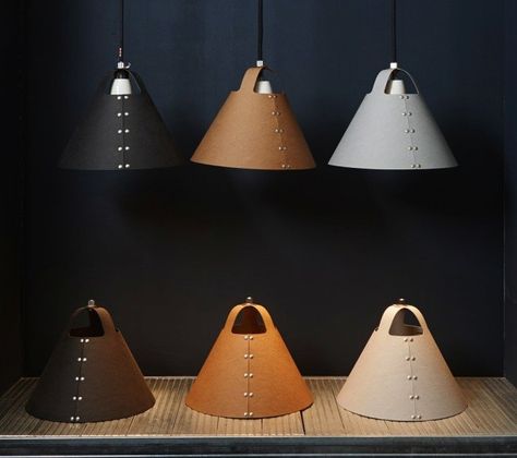 Shigeki Fujishiro's Rivet Lampshades / The Rivet lampshade consists of a single piece of vulcanized fiberboard, a material made of wood pulp and cotton that's typically used for electrical insulation. Above L: It hangs over Fujishiro's desk. Above R: The Rivet Lamp can be ordered from UK shop Folklore for £75. Table Lighting, Deco Nature, Leather Workshop, Led Decor, Leather Decor, Diy Lamp, Leather Projects, Leather Furniture, Leather Gifts