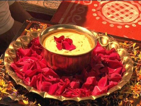 Haldi Ceremony (Preparing the bride and groom with sacred turmeric) Approximate Time: 1 hour, morning Recommended Dress code: Casuals The Haldi ceremony is like an ancient Indian spa ritual. Except… Haldi Rasam, Haldi Ceremony Decorations, शादी की तस्वीरें, Mehendi Decor Ideas, Thali Decoration Ideas, Wedding Gift Pack, Desi Wedding Decor, Marriage Decoration, Ramadan Decoration