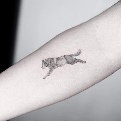 Top 49 Best Small Wolf Tattoo Ideas - [2021 Inspiration Guide] Small Wolf Tattoo For Women, Tiny Wolf Tattoo, Single Needle Tattoo Ideas, Wolf Tattoo For Women, Two Wolves Tattoo, Wolf Paw Tattoos, Simple Wolf Tattoo, Wolf Pack Tattoo, Celtic Wolf Tattoo