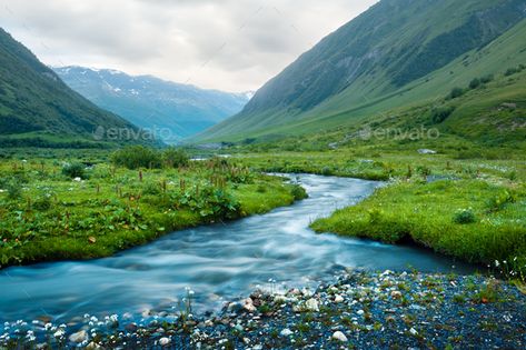 Amazing landscape with river and green grass in spring Caucasus mountains Landscape With River, River Scenery, Plains Landscape, Ipad Backgrounds, Caucasus Mountains, Ipad Background, Bible Pictures, Mountain River, Blue River