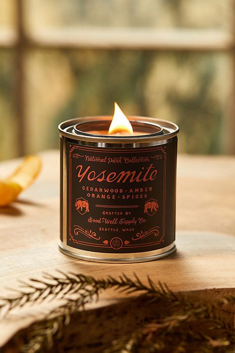 Hand-poured in the USA, this wooden wick candle from Good Well is inspired by the sights, sounds, and scents of national parks. Scent Notes Joshua Tree (red): lavender, cedar, white sage Grand Canyon (tan): huckleberry, bergamot, balsam fir, vanilla Zion (yellow): desert lavender, sage, dried herbs Banff (black): spruce needle, cedar, citrus Redwood (white): oakmoss, citrus, sage, damp earth Yosemite (black): cedarwood, amber, orange, spice | National Park Tin Candle in Black at Terrain Nature, Candles In Tin Cans, Anthropologie Candle, Red Lavender, Black Spruce, Wooden Wick Candles, Tin Candle, Balsam Fir, Lavender Sage