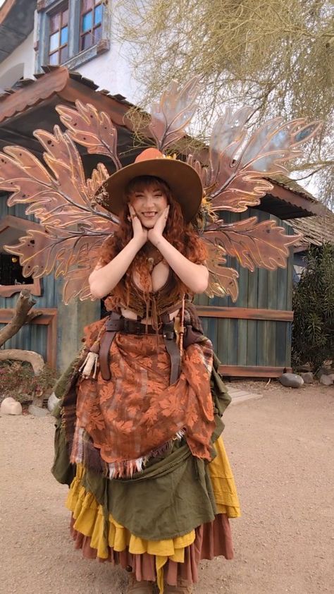 ᎮᎩᎮᎮᎥᏁ ᎧᏗᏦᏕᏂᎥᏒᏋ on Instagram: “Who's ready for Renaissance Festival season?!?! 🧡🍁🧡 Wings @wearablewhimzy Leather tops new pterodactyl leather Vest…” Renisance Fair Fairy Outfit, Cool Ren Faire Outfits, Easy Renfaire Costume, Orange Ren Faire Outfit, Cottage Core Cosplay, Ren Fest Outfits Plus Size, Faerie Ren Faire, Fairy Rennaisance Outfits, Rennisance Faire Costumes Fairy