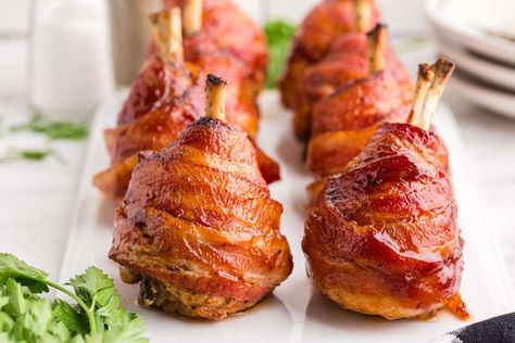 Bacon Wrapped Chicken Lollipops Bacon Wrapped Chicken Lollipops, Chicken Drum Sticks, Baked Bacon Wrapped Chicken, Chicken Lollipop, Chicken Drums, Chicken Lollipops, Wrapped In Bacon, Wrapped Chicken, Family Fresh Meals