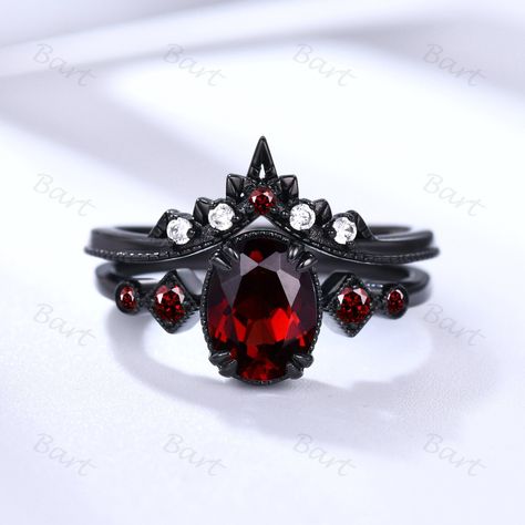 Rhodium Black Gold Oval Garnet Ring, Punky Style Black Ring,Five Stone Garnet Engagement Ring, Black and Red Promise Ring January Birthstone ★ Product Specifications 1. Oval Garnet & Four garnet Side Stone Engagement Ring: Metal Type: 14K Black Gold Center Stone: 6*8mm Oval Natural Garnet Side Stone: Round cut Natural Garnet 8-Prongs pave set Same style ring set: https://www.etsy.com/listing/1614839322/black-gold-alexandrite-ring-set-color With Alexandrite: https://www.etsy.com/listing/162902687 Black And Red Wedding Rings Women, Black Ring With Red Stone, Black And Red Rings Engagement, Persephone Engagement Ring, Black And Red Ring, Black And Red Engagement Ring, Goth Wedding Ring Victorian Gothic, Red And Black Engagement Rings, Red Promise Rings