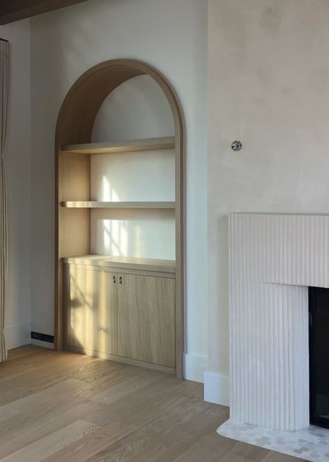 Modern Built In Cabinets, Built In Arched Shelves Living Room, Arched Nook In Wall, Plaster Built In, Built In Arched Cabinet, Organic Modern Built In, Arch Wall Built In, Deep Alcove Ideas, Arched Shelves Fireplace