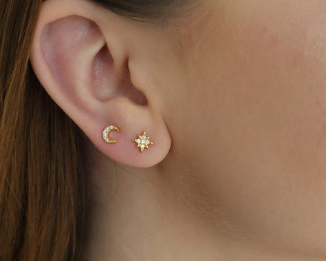 ❤More Style at https://www.etsy.com/ca/shop/HintFineJewelry PLEASE READ BEFORE PLACING YOUR ORDER. Mismatch Moon Star Studs  ----------------♥ DETAILS ♥-------------------- * ⚠️ Includes 1 piece star stud and 1 piece moon stud ⚠️ * Butterfly pushback backings *  Each measures ~ 7 mm ----------------♥ MATERIAL ♥-------------------- Gold Finish: 18 K Gold Plated on Sterling Silver Silver Finish: 925 Sterling Silver Rhodium plated ----------------♥ OTHER INFO ♥-------------------- * Nickel and Lead-free * Hypoallergenic / Made for Sensitive Skin ----------------♥ PACKAGING ♥-------------------- Ready to gift in a beautiful HINT gift box. ----------------♥ SHIPPING ♥-------------------- ★ United States 🇺🇸 - USPS First Class Airmail with Tracking ⋆ Arrival Time: approximately 4 - 8 business d Second Stud, Earrings Cartilage, Cartilage Stud, Moon Studs, Star Earrings Stud, Moon And Star, Rural Area, Moon Star, Canada Post