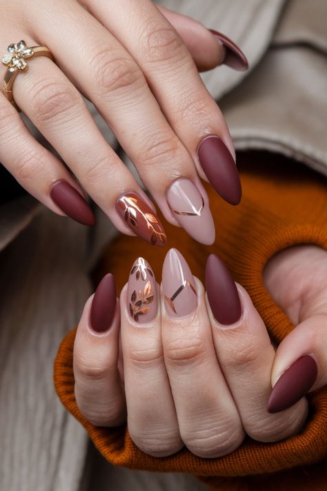 Get ready to flaunt your creativity with these stunning dip nails that embody the essence of fall. Picture rich burgundy and deep forest green, elegantly layered to capture the beauty of autumn leaves. Add a touch of gold shimmer for a chic twist that will turn heads wherever you go. These fall nail ideas are perfect for any occasion, celebrating the season in style. Embrace the trend and let your nails do the talking! #FallNailIdeas #DipNails #AutumnNails Cranberry And Gold Nails, Fall Nails Ideas Autumn Burgundy, Burgundy With Gold Nails, Fall Season Nails Almond, Green And Copper Nails, Nails With Leaves Fall, Autumn Dip Nails, Fall Nail Designs Red, Nails Ideas Burgundy