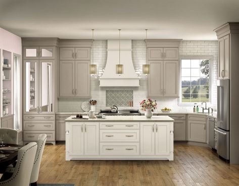 Be sure you'll love your cabinets before you place your final order. It's easy with sample doors from KraftMaid. Seeing a sample firsthand in the space it will be installed, gives you complete confidence that you're making the right decision. It also makes it easier to coordinate other design selections, like countertops, hardware, and paint. And with KraftMaid's Lifetime Limited Warranty and quality craftsmanship, you can buy with confidence. KraftMaid Deveron 14.625-in W x 14.625-in H Moonshin Staggered Height Kitchen Cabinets, Small Kitchen Remodel Cabinets, Kraft Maid Kitchen Cabinet Colors, Natural Cream Kitchen Cabinets, White Wash Cabinets Kitchen, Ivory Cabinets Kitchen, Light Beige Kitchen Cabinets, Antique White Kitchen Cabinets Farmhouse, White Countertops White Cabinets