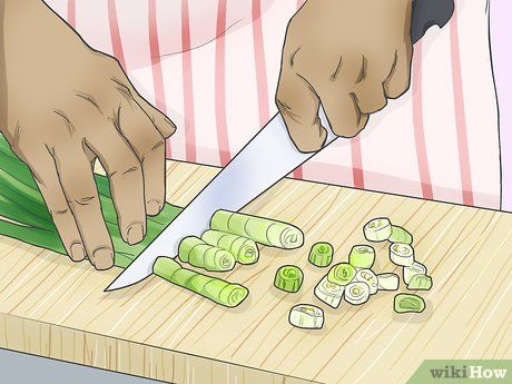 How to Store Scallions: 10 Steps (with Pictures) - wikiHow How To Freeze Scallions, Freezing Scallions, How To Store Scallions, Preserving Scallions, Storing Veggies, How To Store, Fresh Produce, Green Onions, Food Store