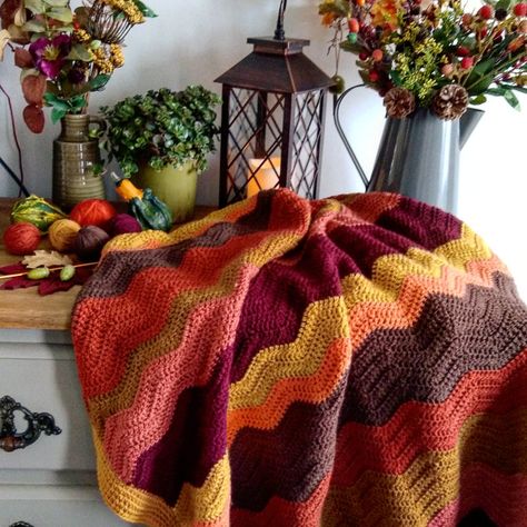 Autumn ripple blanket by Sarah-Jane Ireland. Crochet Fall Blanket, Crochet Blanket Patterns Autumn, Autumn Crochet Blanket, Rust Crochet Blanket, Crochet Blanket Autumn Colours, Afgans Crochet, Autumn Leaves Crochet Blanket, Spider Web Shawl, Crochet Spider Web