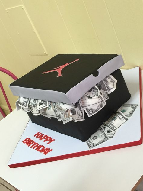 Jordan shoe box with money cake Shoe Box Of Money, Jordan Shoe Cake Birthday, Shoe Cakes For Men, Nike Shoe Box Cake, Shoe Cake Ideas, Jordan Cake Ideas, Sneaker Cake Ideas, Jordan Birthday Cake, Jordan Shoe Cake