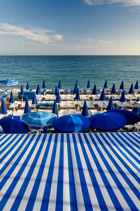 Blue and white striped awnings make for the perfect beach scene. Juan Les Pins, Everything Is Blue, Blue Inspiration, Beach Blue, Pool Bar, By The Ocean, Nice France, Private Beach, Feeling Blue